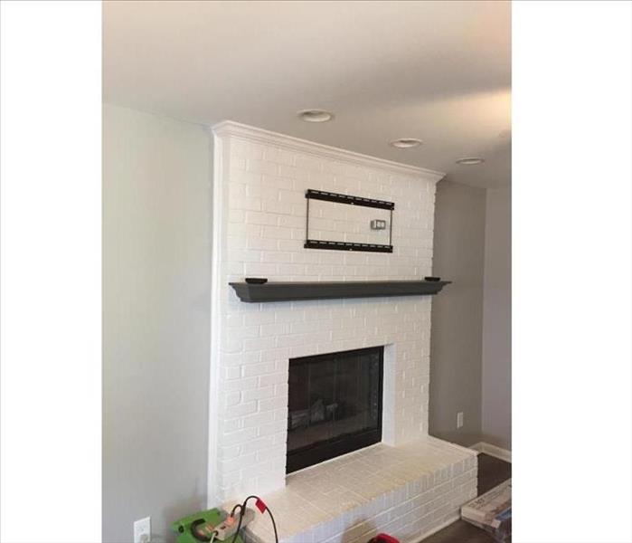 A renovated, brand-new fireplace.