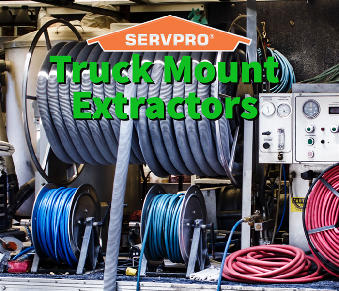 A SERVPRO truck mount extractor in action.