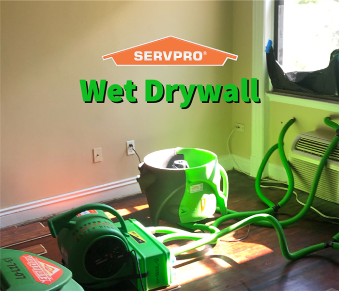 Wet drywall being dried by the professionals at SERVPRO